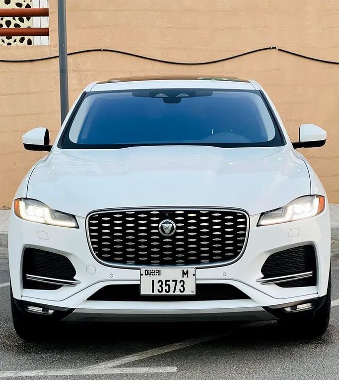 Used Jaguar F-Pace I Facelift, 2.0 l, 2021 in UAE, Ajman by AMG Cars, White color. American Specs | AUTO.AE | Listing #278677