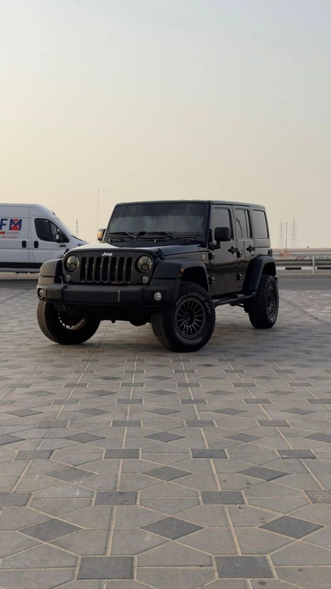 Подержанный Jeep Wrangler III (JK), 3.6 л, 2017 в Аджмане от Abu Rashid Cars  Черный цвет. GCC | AUTO.AE