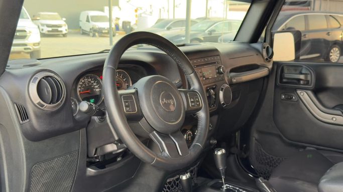 Подержанный Jeep Wrangler III (JK), 3.6 л, 2017 в Аджмане от Abu Rashid Cars  Черный цвет. GCC | AUTO.AE