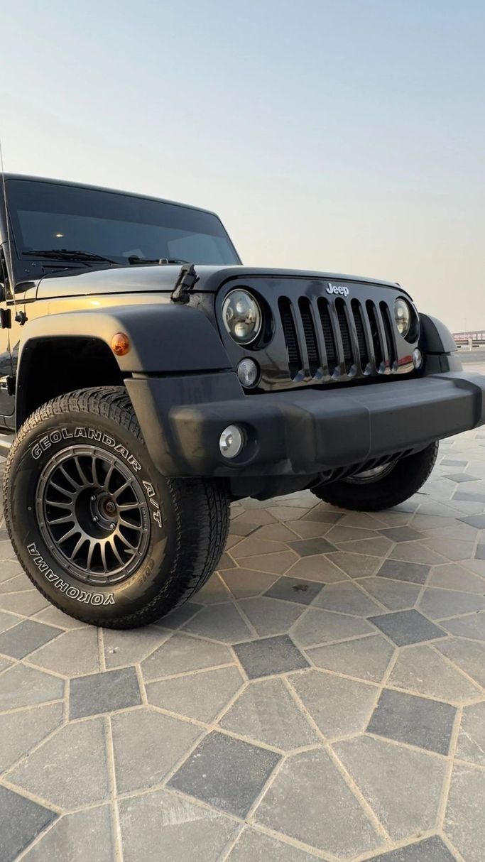 Подержанный Jeep Wrangler III (JK), 3.6 л, 2017 в Аджмане от Abu Rashid Cars  Черный цвет. GCC | AUTO.AE