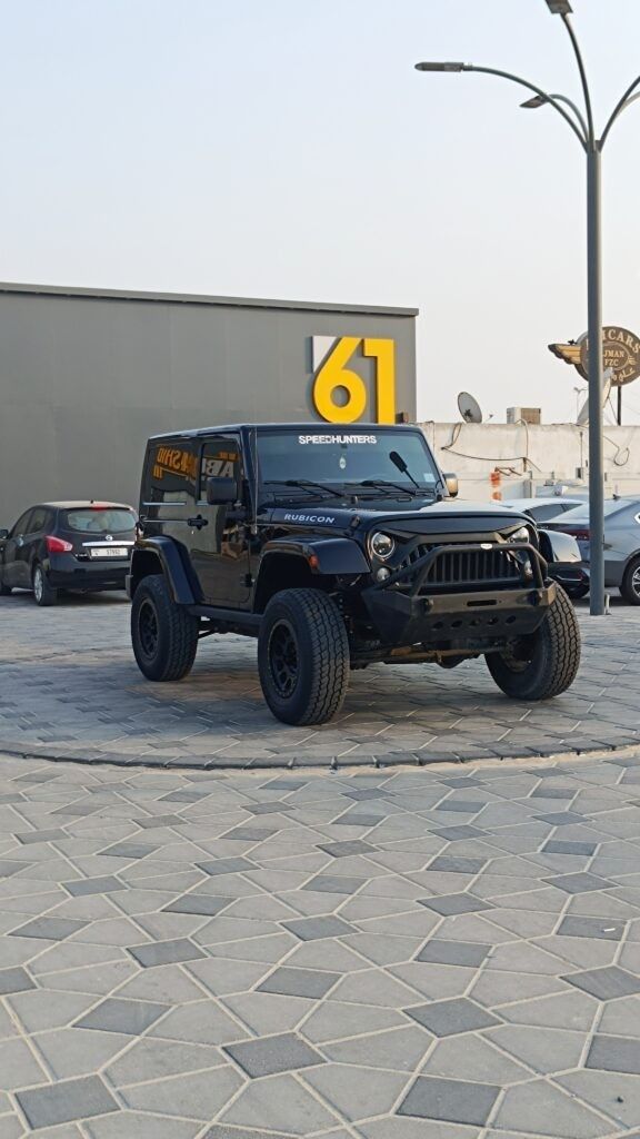 Used Jeep Wrangler III (JK), 3.6 l, 2016 in Ajman by DEAL CARS, Black color. American Specs | AUTO.AE
