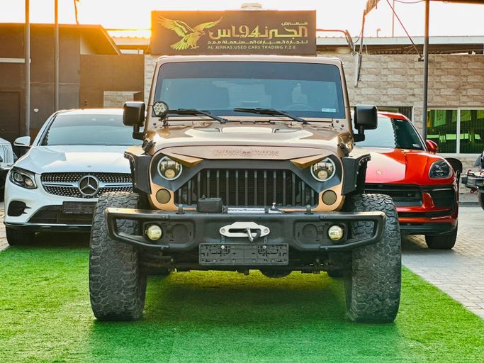 مستعملة Jeep Wrangler III (JK), 3.6 l, 2015 في في عجمان من Al Jernas Used Cars Trading FZE، اللون ذهبي. مواصفات الخليج | AUTO.AE | إعلان #271869