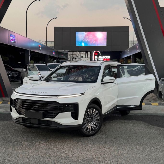 Новый Jetour X70 PLUS I Рестайлинг, 1.6 л, 2025 в Аджмане от Syria Motors Белый цвет. Китайская | AUTO.AE