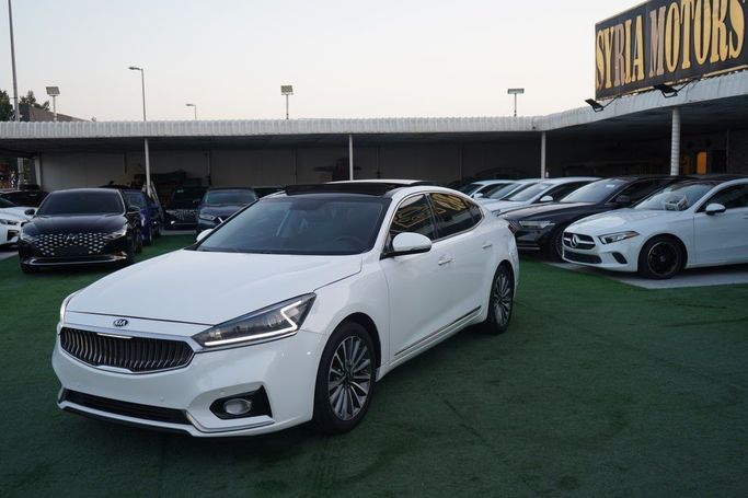 Подержанный Kia Cadenza II, 3.3 л, 2017 в Аджмане от Syria Motors Белый цвет.  | AUTO.AE