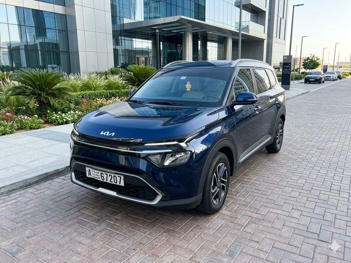 Kia Carens IV (KY), 2024 внедорожник 5 дв.  класса в Аджмане от Eagle Rent A Car синий цвет | AUTO.AE | Объявление #1540