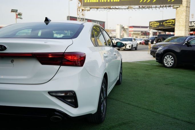 Used Kia Forte III, 2.0 l, 2020 in Ajman by Syria Motors, White color. American Specs | AUTO.AE