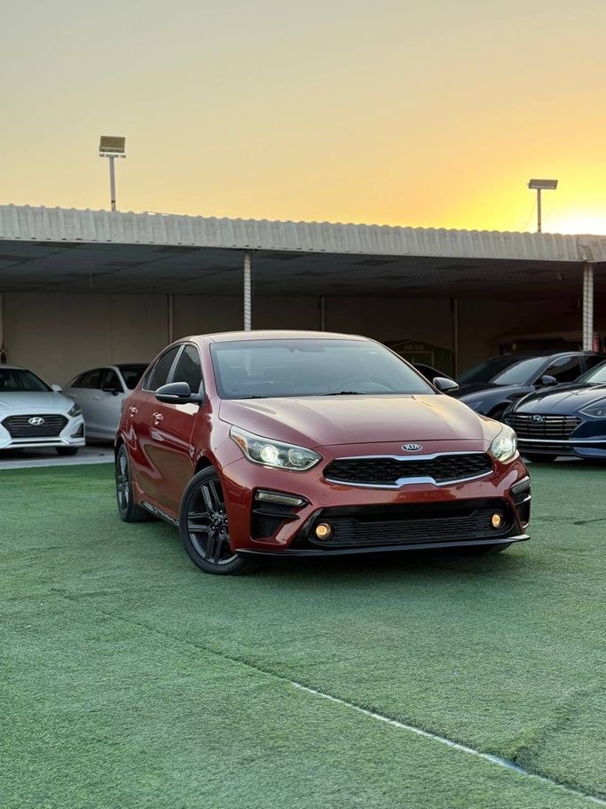 Подержанный Kia Forte III, 2.0 л, 2020 в Аджмане от Syria Motors Оранжевый цвет. Американская | AUTO.AE