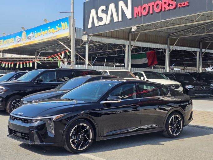 Подержанный Kia K4, 2.0 л, 2025 в Аджмане от Asan Motors Черный цвет. Американская | AUTO.AE
