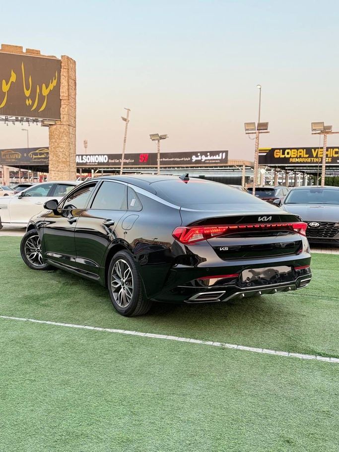 Подержанный Kia K5 III, 2.0 л, 2023 в Аджмане от Syria Motors Черный цвет. Корейская | AUTO.AE