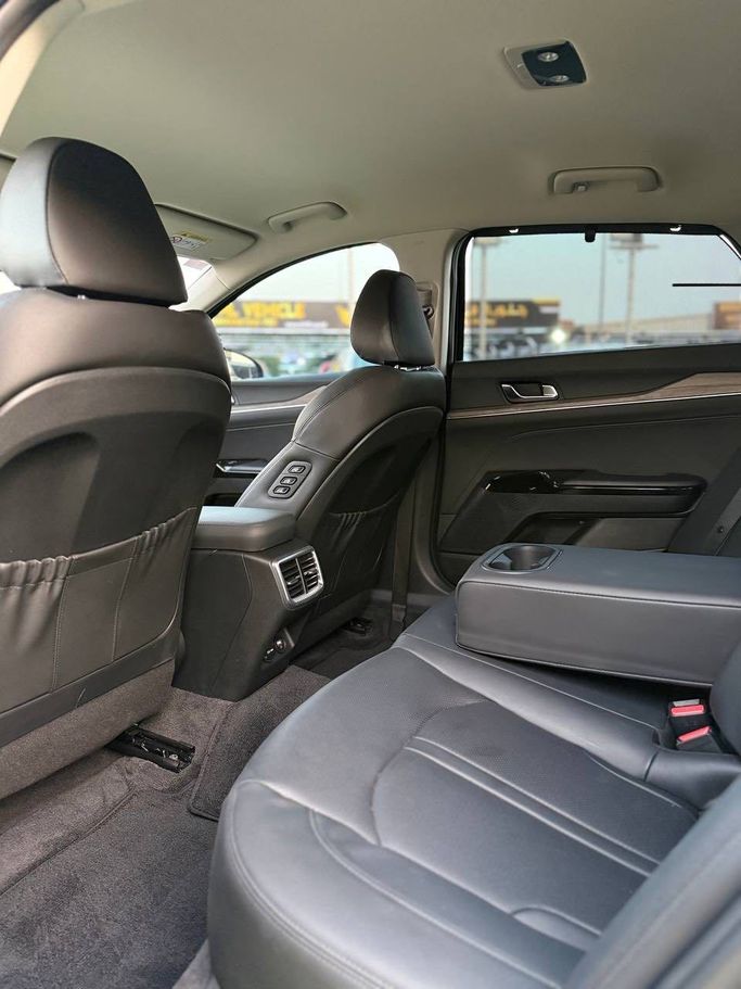 Подержанный Kia K5 III, 2.0 л, 2023 в Аджмане от Syria Motors Черный цвет. Корейская | AUTO.AE