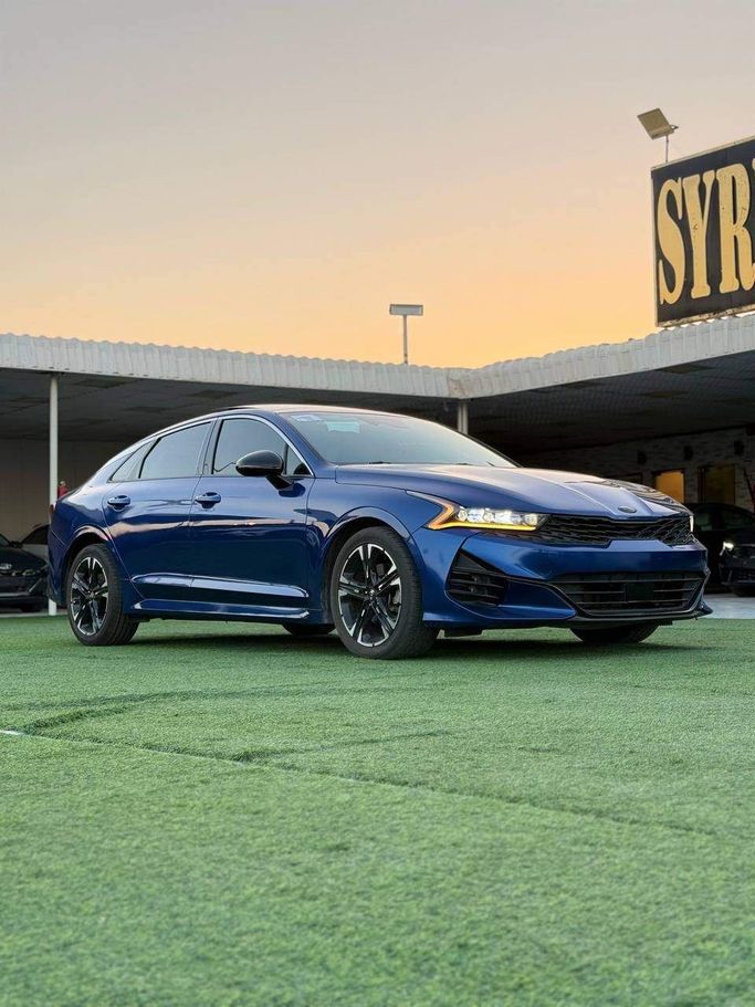 Used Kia K5 III, 1.6 l, 2021 in Ajman by Syria Motors, Blue color. American Specs | AUTO.AE