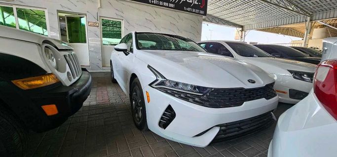 Подержанный Kia K5 III, 1.6 л, 2021 в Аджмане от AL AREF MOTORS FZC Белый цвет. Other | AUTO.AE