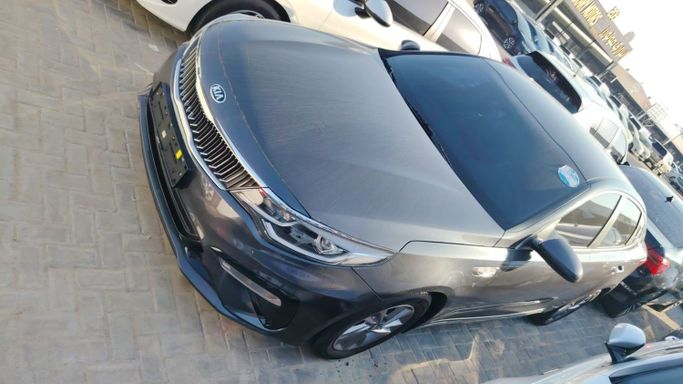 Used Kia K5 III, 2.0 l, 2020 in Ajman by Al Hadaf Motors, Grey color.  | AUTO.AE