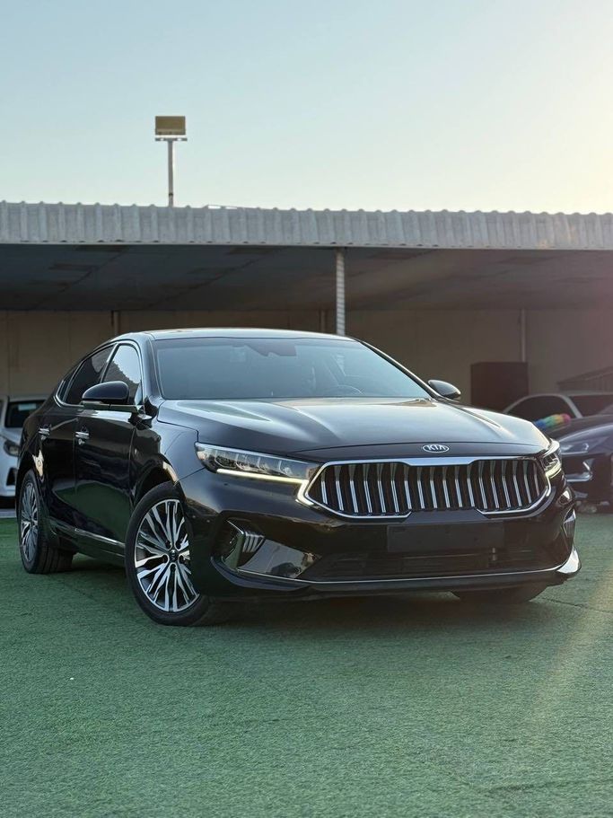 Подержанный Kia K7 YG (II) Рестайлинг, 3.0 л, 2021 в Аджмане от Syria Motors Черный цвет. Корейская | AUTO.AE