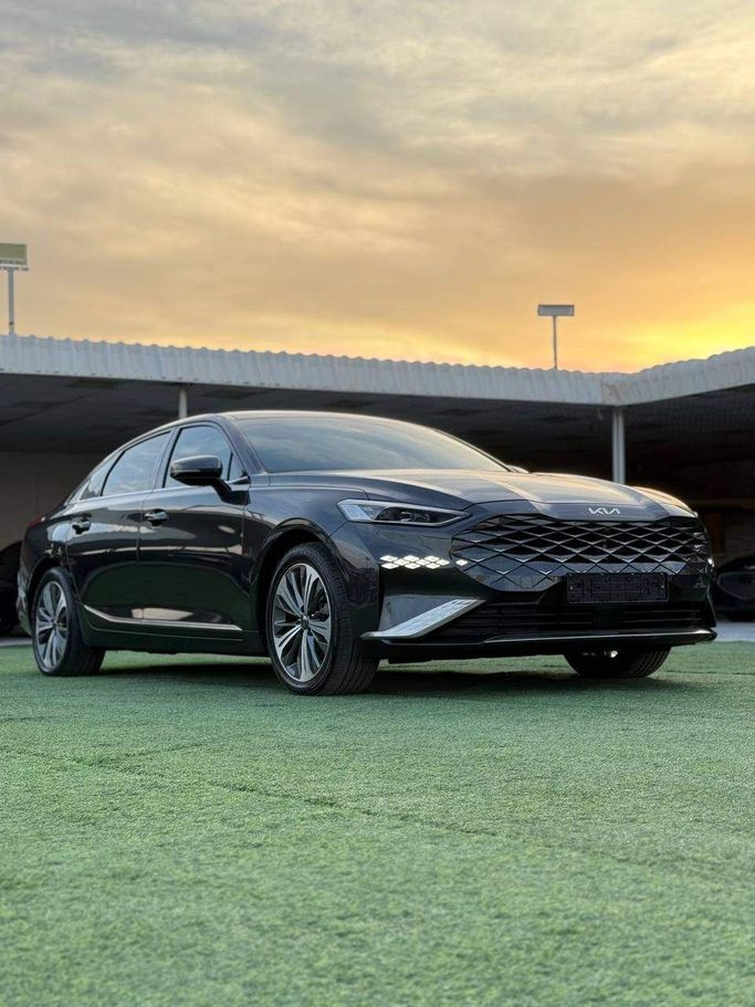 Подержанный Kia K8 I, 1.6 л, 2024 в Аджмане от Syria Motors Серый цвет. Корейская | AUTO.AE