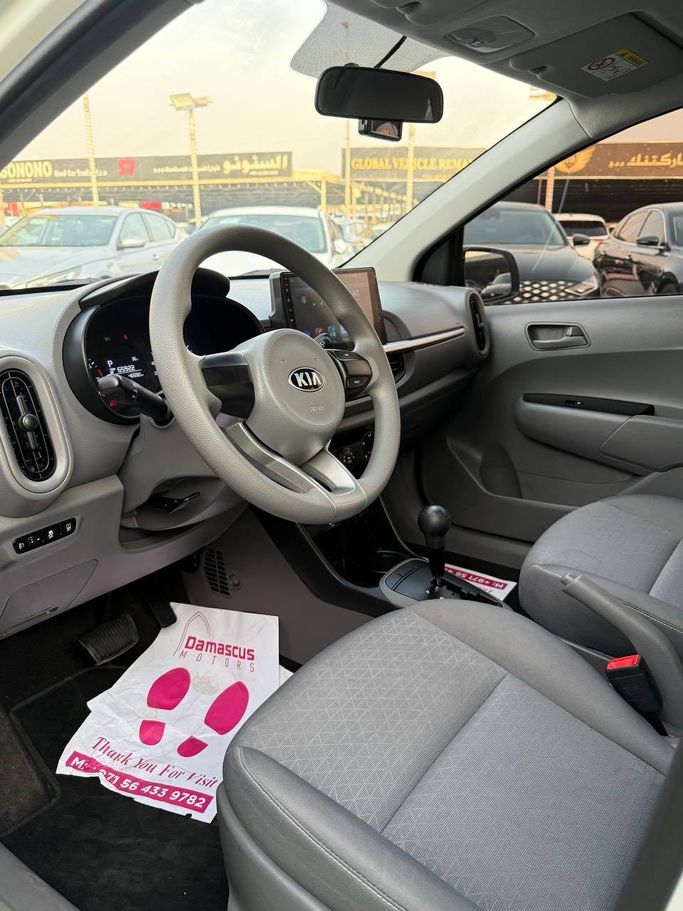 Used Kia Morning III Facelift 1, 1.0 l, 2021 in Ajman by Syria Motors, White color. Korean Specs | AUTO.AE