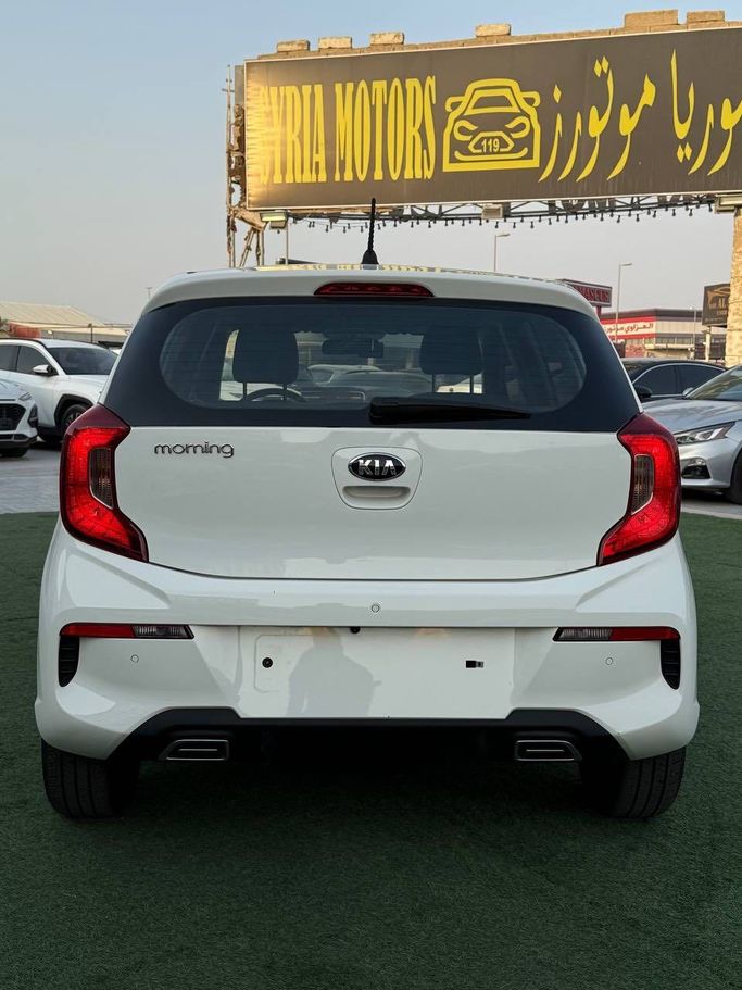 Used Kia Morning III Facelift 1, 1.0 l, 2021 in Ajman by Syria Motors, White color. Korean Specs | AUTO.AE