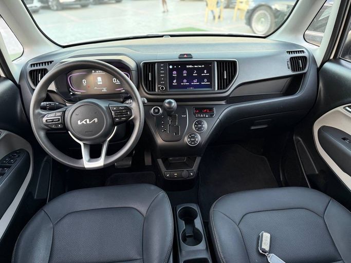 Подержанный Kia Ray I Рестайлинг 2, 1.0 л, 2023 в Аджмане от Syria Motors Белый цвет. Корейская | AUTO.AE