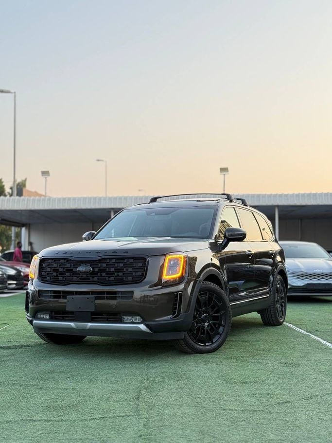Подержанный Kia Telluride I, 3.8 л, 2021 в Аджмане от Syria Motors Коричневый цвет. Американская | AUTO.AE