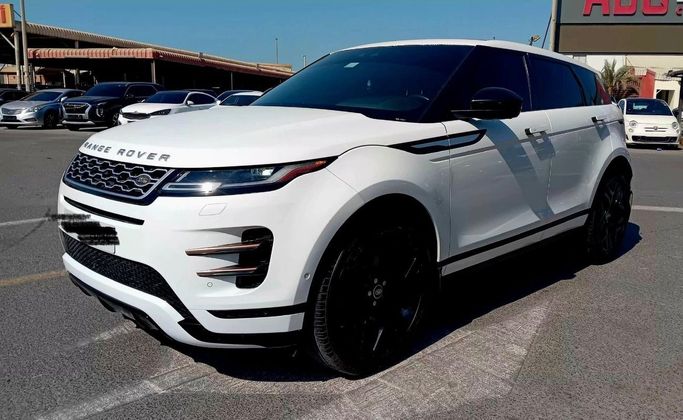Подержанный Land Rover Range Rover Evoque P250 II, 2.0 л, 2021 в Аджмане от DAR AL SAFWA USED CARS Белый цвет. Американская | AUTO.AE