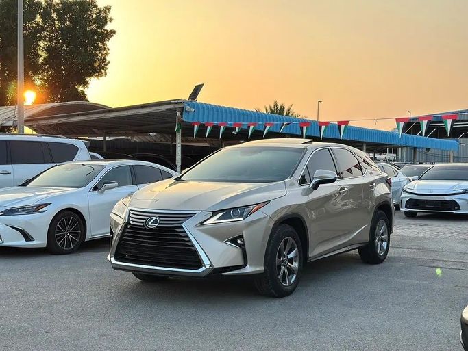 Подержанный Lexus RX 350 IV, 3.5 л, 2019 в Аджмане от SHEIKH MORAD USED CARS Золотистый цвет. GCC | AUTO.AE