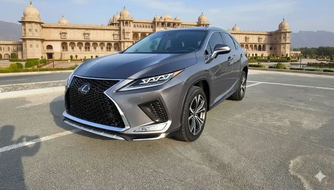 Подержанный Lexus RX 350 IV Рестайлинг, 3.5 л, 2019 в Аджмане от Al Tahmena Used Cars Серый цвет. Американская | AUTO.AE