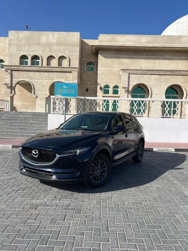 مستعملة Mazda CX-5 ثانياً, 2.0 l, 2021 في في عجمان من AL SAFEER MOTORS، اللون أزرق. مواصفات الخليج | AUTO.AE