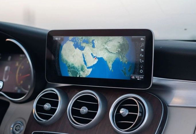 Подержанный Mercedes-Benz C-Class 300 IV (W205) Рестайлинг, 2.0 л, 2019 в Аджмане от AMG Cars Черный цвет. Американская | AUTO.AE