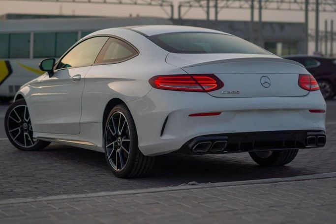 Used Mercedes-Benz C-Class 300 IV (W205) Facelift, 2.0 l, 2020 in Ajman by AMG Cars, White color. American Specs | AUTO.AE