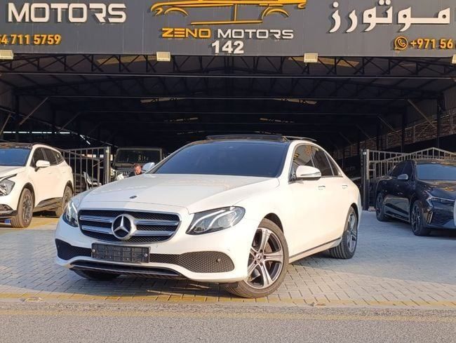 Подержанный Mercedes-Benz E-Class 300 V (W213, S213, C238), 2.0 л, 2019 в Аджмане от Zeno Motors Fze Белый цвет. Корейская | AUTO.AE