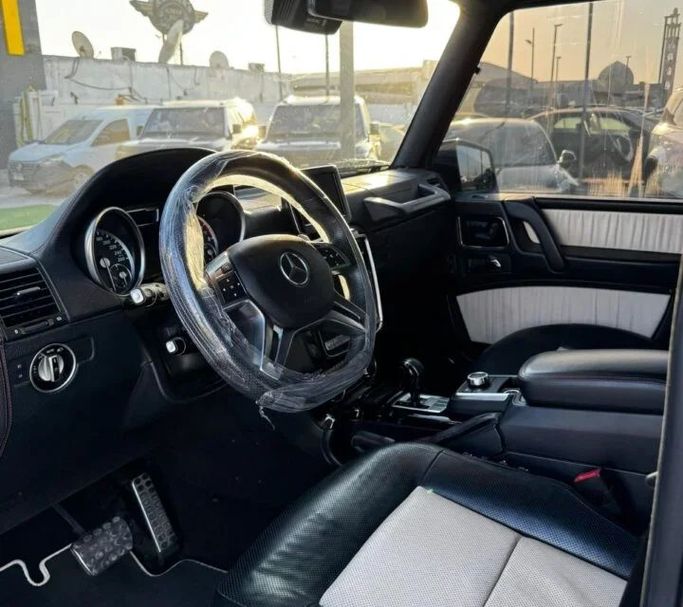 Подержанный Mercedes-Benz G-Class 550 II (W463) Рестайлинг 4, 4.0 л, 2015 в Аджмане от Abu Rashid Cars  Белый цвет. GCC | AUTO.AE