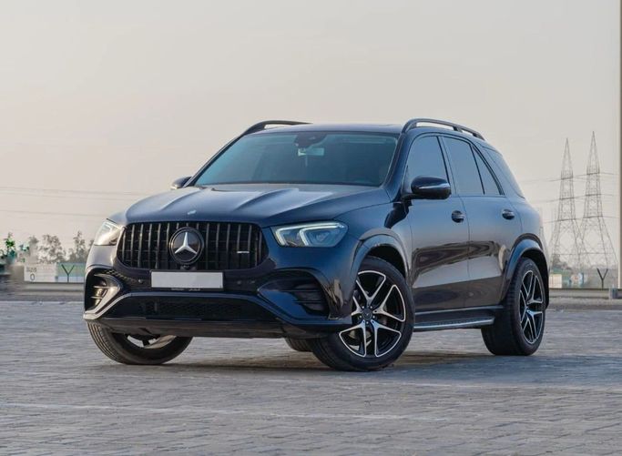 Подержанный Mercedes-Benz GLE 350 II (V167), 2.0 л, 2020 в Аджмане от AMG Cars Синий цвет. Американская | AUTO.AE