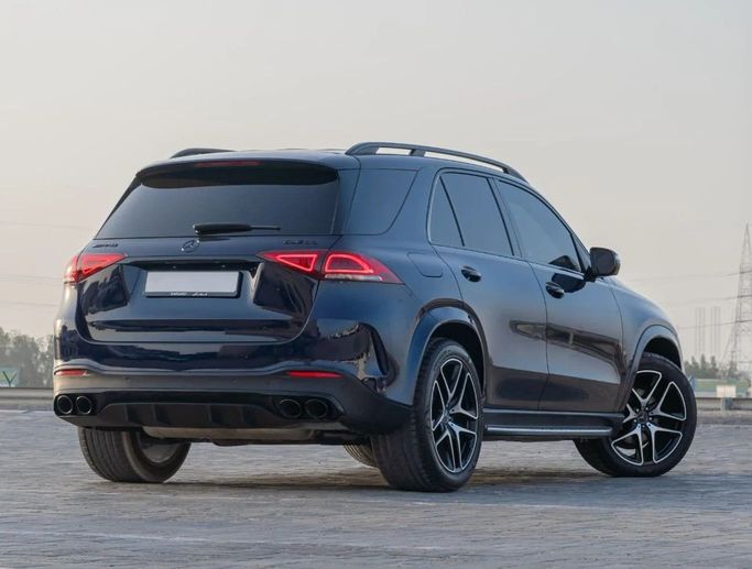 Подержанный Mercedes-Benz GLE 350 II (V167), 2.0 л, 2020 в Аджмане от AMG Cars Синий цвет. Американская | AUTO.AE