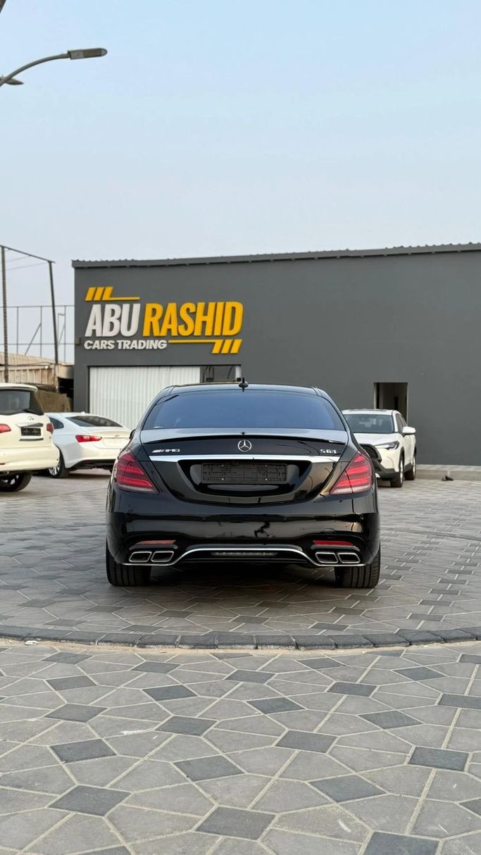 Подержанный Mercedes-Benz S-Class 550 VI (W222, C217), 4.7 л, 2015 в Аджмане от Abu Rashid Cars  Черный цвет. Американская | AUTO.AE