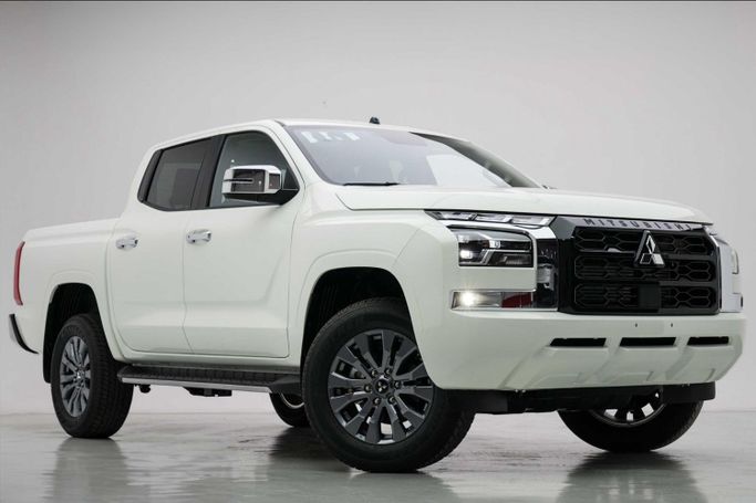 Новый Mitsubishi L200 VI, 2.4 л, 2025 в Аджмане от AUTOCARS FZE Белый цвет.  | AUTO.AE