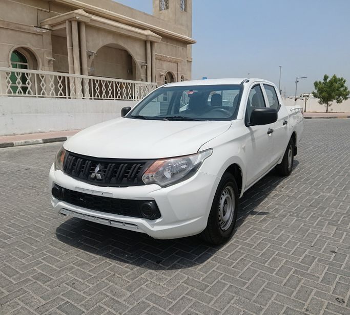 Used ⁦Mitsubishi L200 V Facelift, 2.4 l, 2018⁩ in UAE, Ajman, White color. GCC Specs | AUTO.AE | Listing #286800