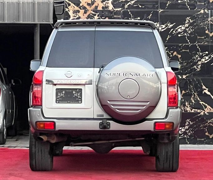 Подержанный Nissan Patrol V (Y61) Рестайлинг, 4.8 л, 2021 в Аджмане от Abu Rashid Cars  Белый цвет. GCC | AUTO.AE