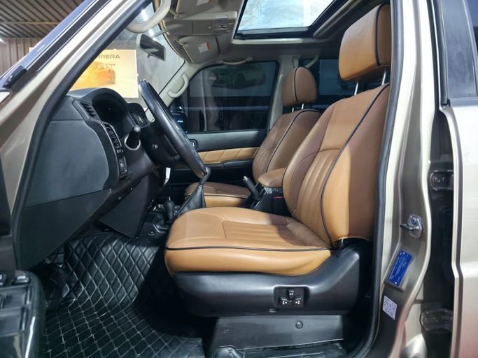 Подержанный Nissan Patrol V (Y61) Рестайлинг, 4.8 л, 2020 в Аджмане от Abu Rashid Cars  Золотистый цвет. GCC | AUTO.AE