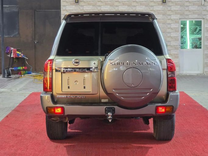 Подержанный Nissan Patrol V (Y61) Рестайлинг, 4.8 л, 2019 в Аджмане от Abu Rashid Cars  Золотистый цвет. GCC | AUTO.AE