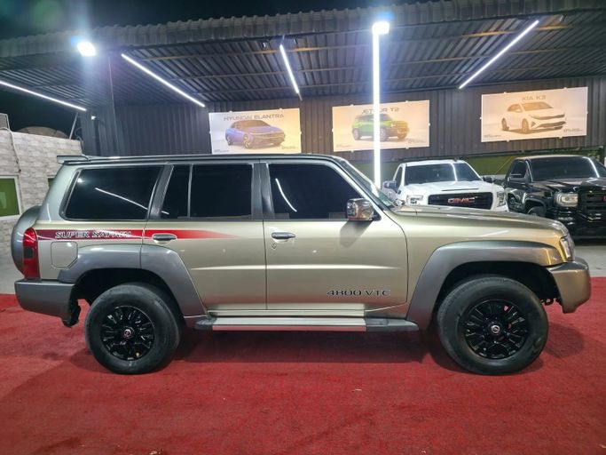 Подержанный Nissan Patrol V (Y61) Рестайлинг, 4.8 л, 2019 в Аджмане от Abu Rashid Cars  Золотистый цвет. GCC | AUTO.AE