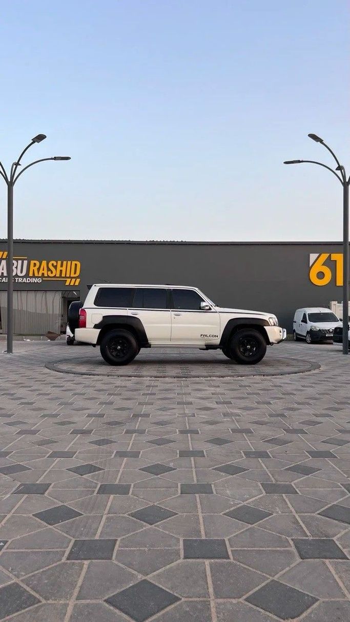 Подержанный Nissan Patrol V (Y61) Рестайлинг, 4.8 л, 2019 в Аджмане от Abu Rashid Cars  Белый цвет. GCC | AUTO.AE