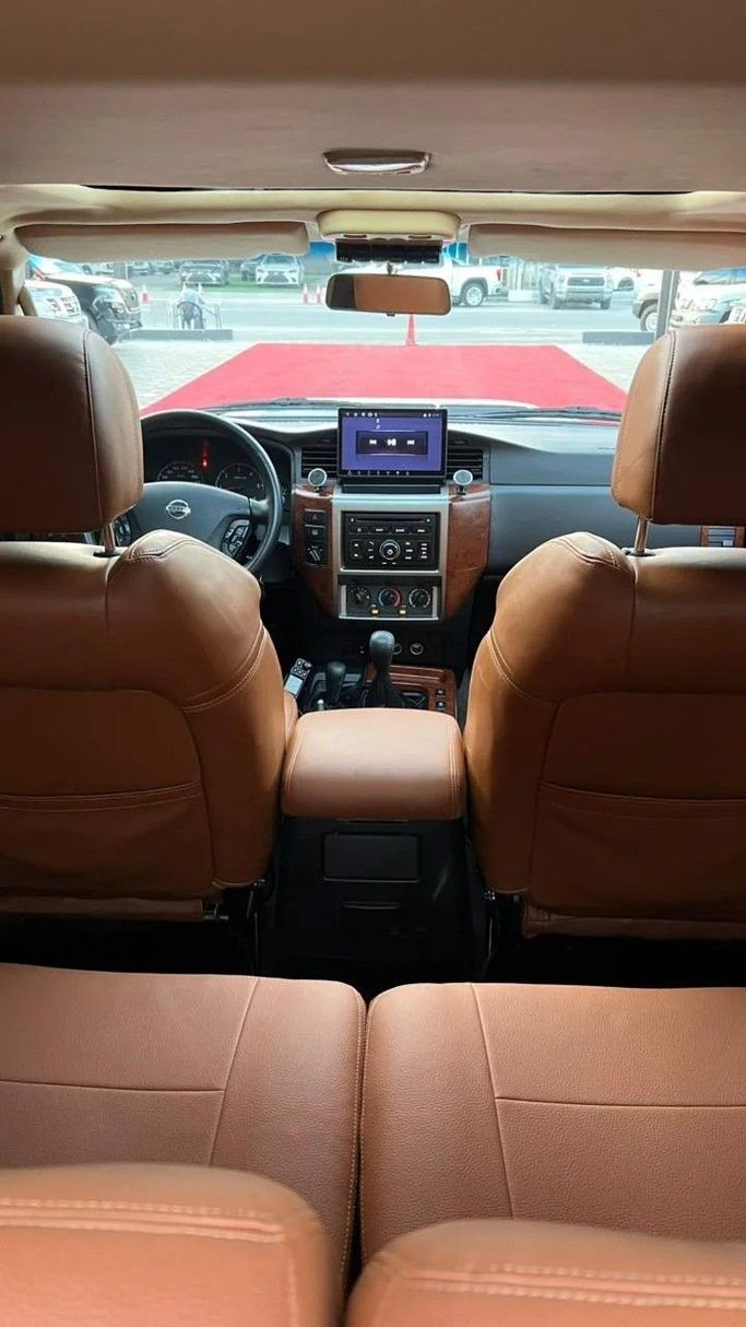 Подержанный Nissan Patrol V (Y61) Рестайлинг, 4.8 л, 2018 в Аджмане от Abu Rashid Cars  Белый цвет. Other | AUTO.AE