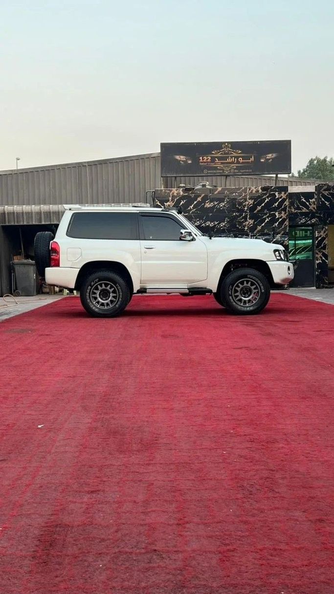 Подержанный Nissan Patrol V (Y61) Рестайлинг, 4.8 л, 2018 в Аджмане от Abu Rashid Cars  Белый цвет. Other | AUTO.AE