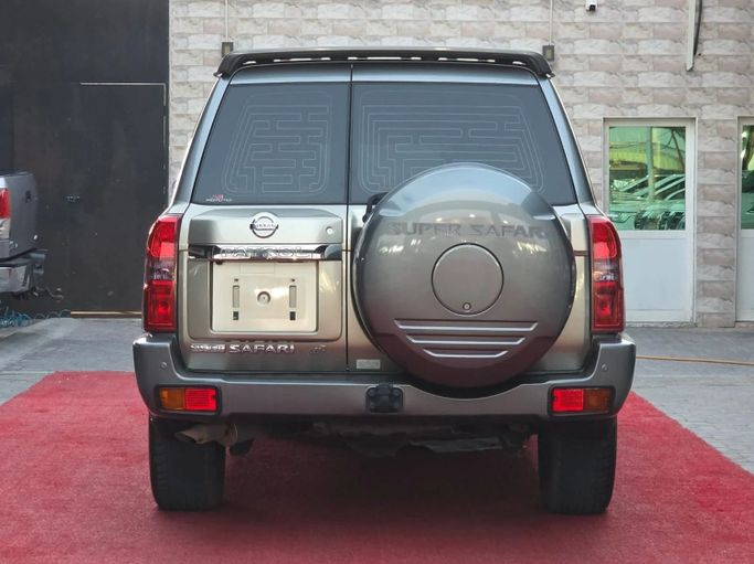 Подержанный Nissan Patrol V (Y61) Рестайлинг, 4.8 л, 2017 в Аджмане от Abu Rashid Cars  Золотистый цвет. GCC | AUTO.AE