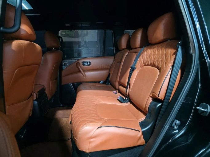 Подержанный Nissan Patrol VI (Y62), 5.6 л, 2013 в Аджмане от Abu Rashid Cars  Черный цвет. GCC | AUTO.AE