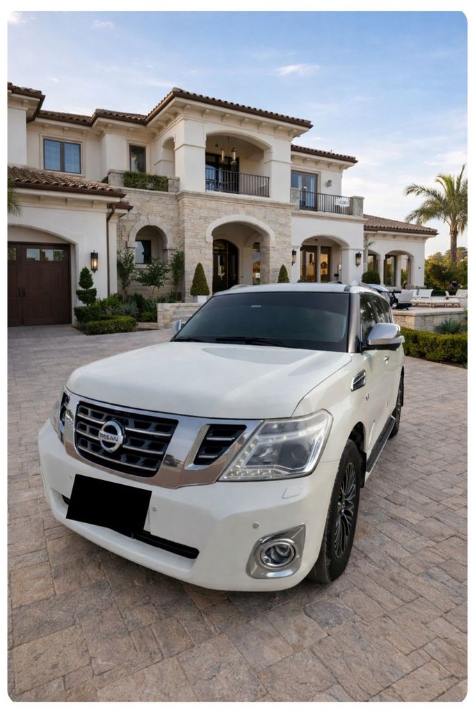 Подержанный Nissan Patrol VI (Y62) Рестайлинг, 5.6 л, 2015 в Аджмане Белый цвет. GCC | AUTO.AE