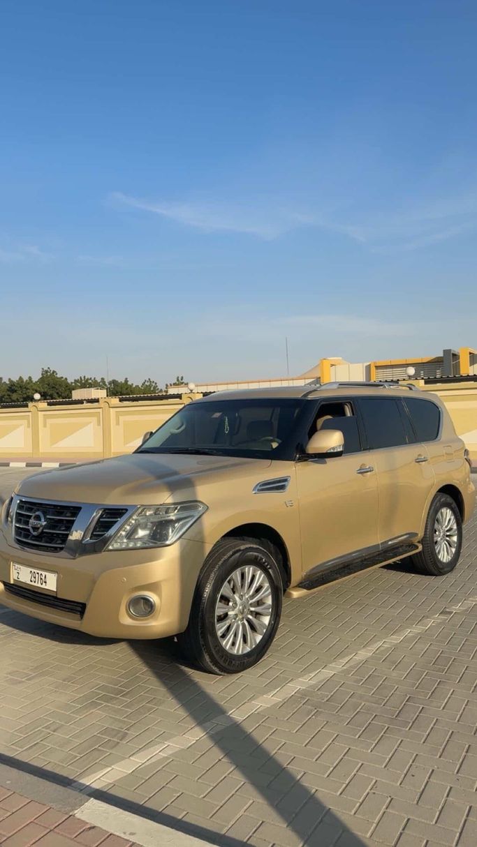 Used Nissan Patrol VI (Y62), 5.6 l, 2012 in Ajman, Golden color. GCC Specs | AUTO.AE