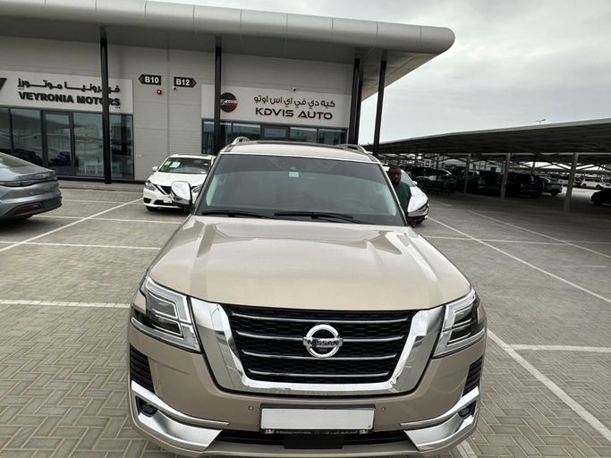 Подержанный Nissan Patrol VI (Y62) Рестайлинг 2, 4.0 л, 2021 в Аджмане от KDVIS Коричневый цвет. GCC | AUTO.AE | Объявление #247823