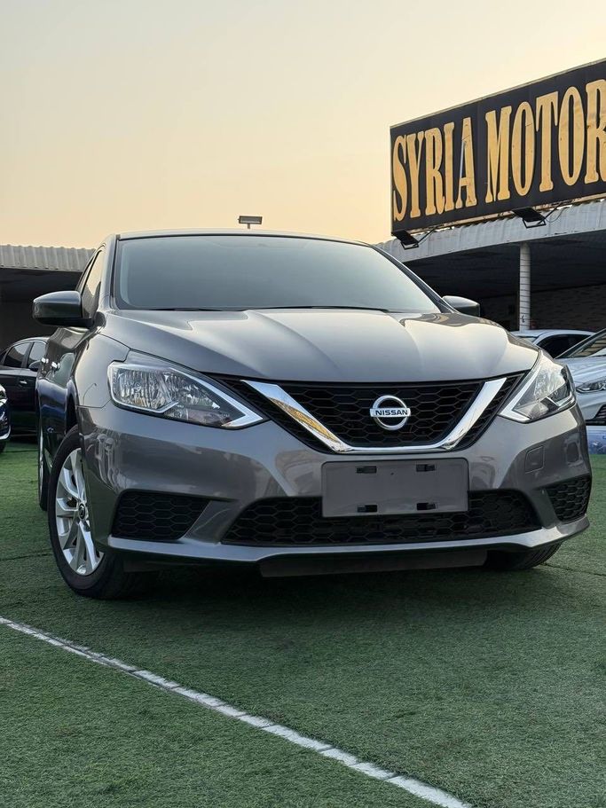 Подержанный Nissan Sentra VIII (B18), 2.0 л, 2021 в Аджмане от Syria Motors Серый цвет. Японская | AUTO.AE