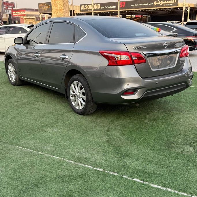 Подержанный Nissan Sentra VIII (B18), 2.0 л, 2021 в Аджмане от Syria Motors Серый цвет. Японская | AUTO.AE